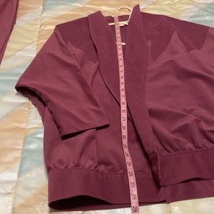 Beautiful suit only wore 2 times like new it’s not red it mauve OBO